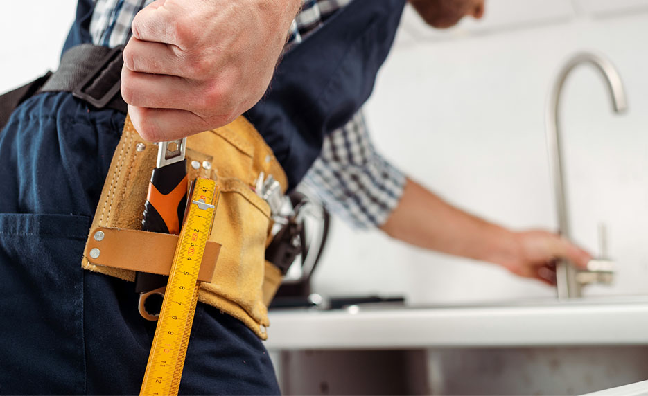 Plumber with practice kit and tools
